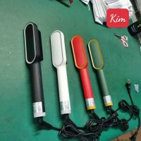 Lược điện làm tóc xoăn - Ảnh 1